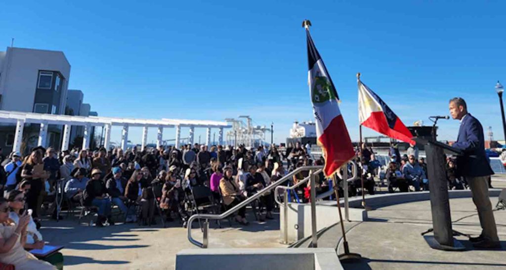 Flanked with the flags of the Philippines and Bohol Province, Philippine Consul General in San Francisco Neil Ferrer gives his remarks during the official opening of the Bohol Circle Immigrant Park in Alameda, California on 21 January 2023. (San Francisco PCG photo) 