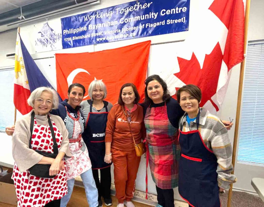 Volunteers (from left) Laila Pires, Fatma Dogus, Dominga Passmore, Annette Beech and Megan Lynch cooked for a cause Feb. 18, with all proceeds going to the Red Cross for earthquake relief in Turkey. FACEBOOK
