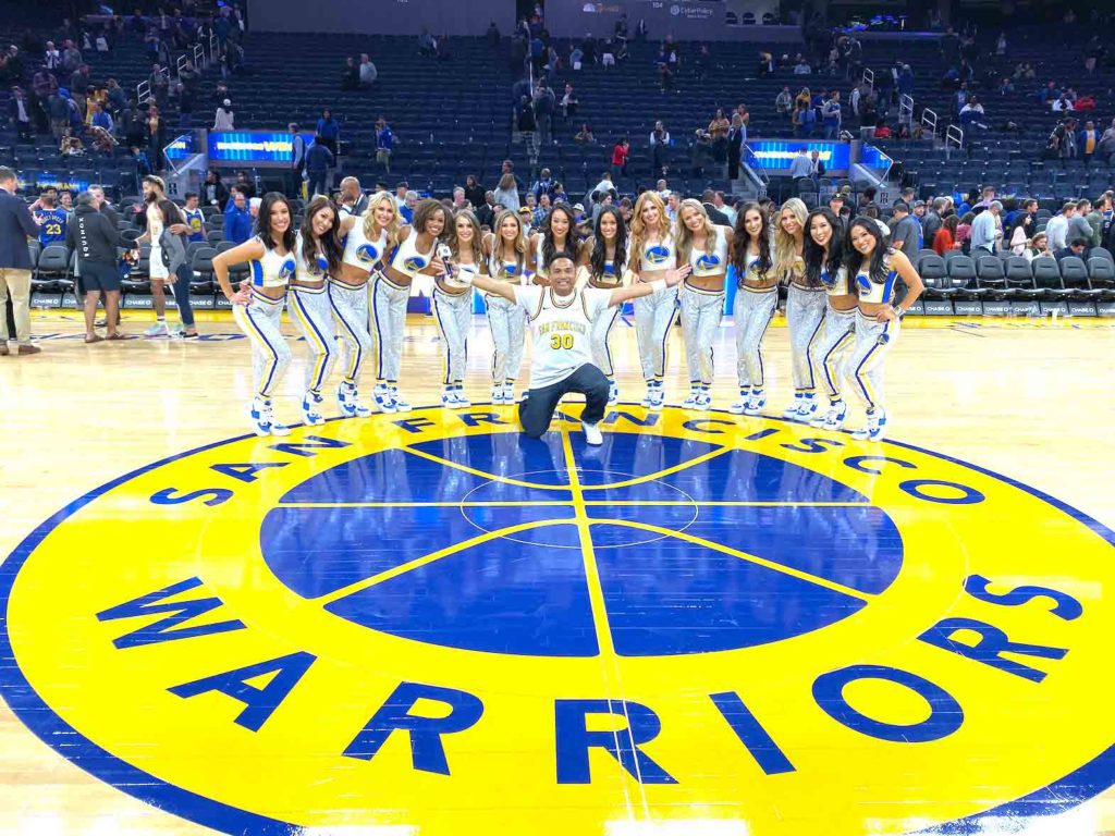 Warriors Hype Man Franco Finn with cheerleaders. CONTRIBUTED