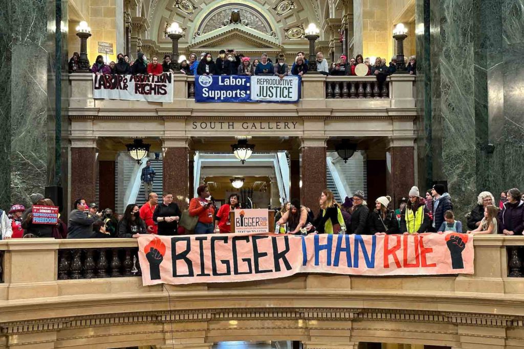 Pro-abortion demonstrators gather at the State Capitol to mark the 50th anniversary of Roe v. Wade, the Supreme Court decision that had established a right to abortion until it was overturned last year, in Madison, Wisconsin, U.S. January 22, 2023. REUTERS/Eric Cox/File Photo
