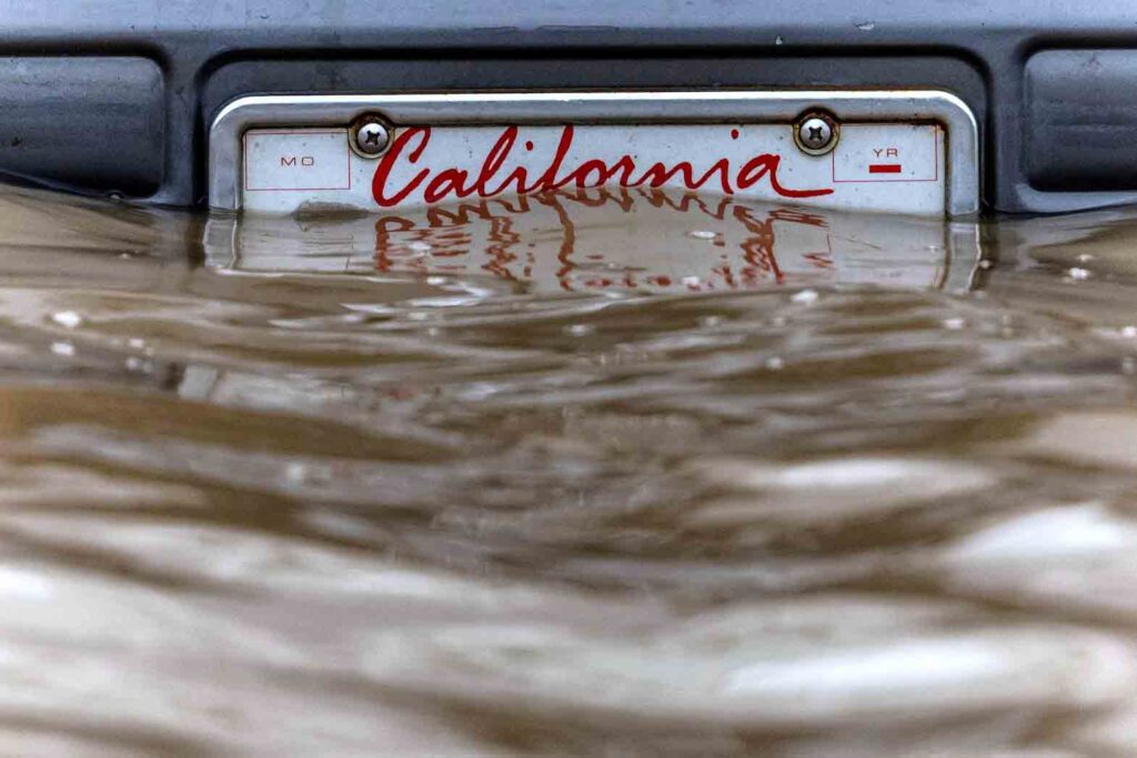 A California plate is seen at an area affected by floods after days of heavy rain in Pajaro, California, U.S., March 14, 2023. REUTERS/Carlos Barria TPX IMAGES OF THE DAY

