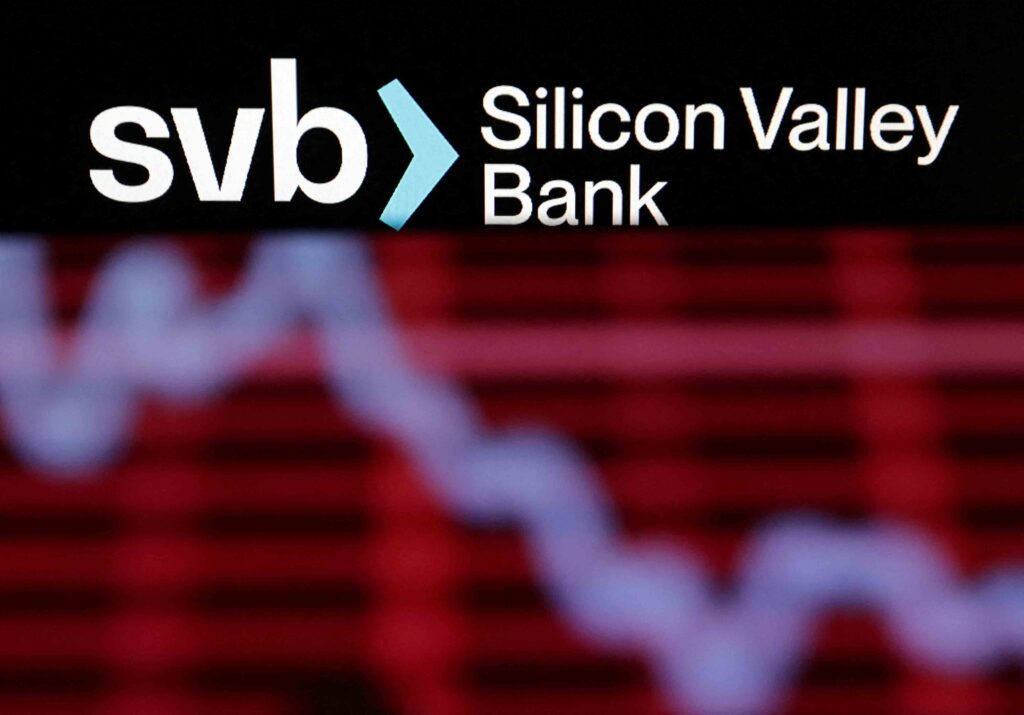 SVB (Silicon Valley Bank) logo and decreasing stock graph are seen in this illustration taken March 19, 2023. REUTERS/Dado Ruvic/Illustration/File Photo