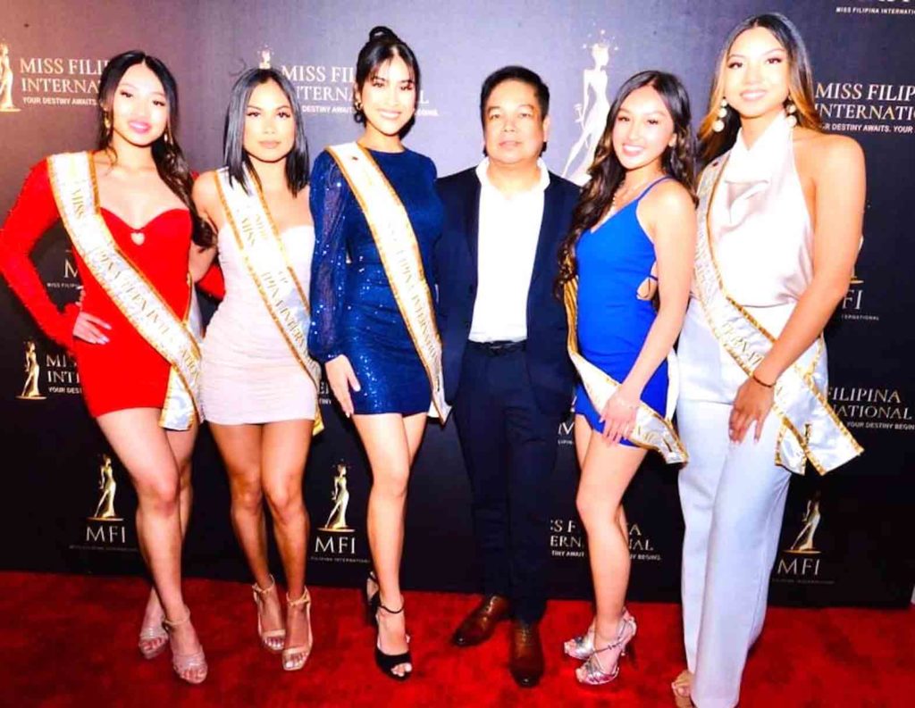 Geoffrey Jimenez with Miss Filipina International title holders. (Photo by Joe Cobilla)