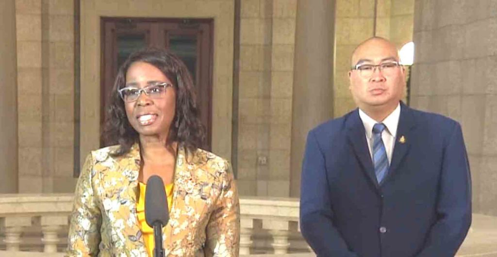 Health Minister Audrey Gordon at a news conference on Wednesday with Advanced Education Minister Jon Reyes, who was on the recruitment mission to the Philippines last month. (CBC)
