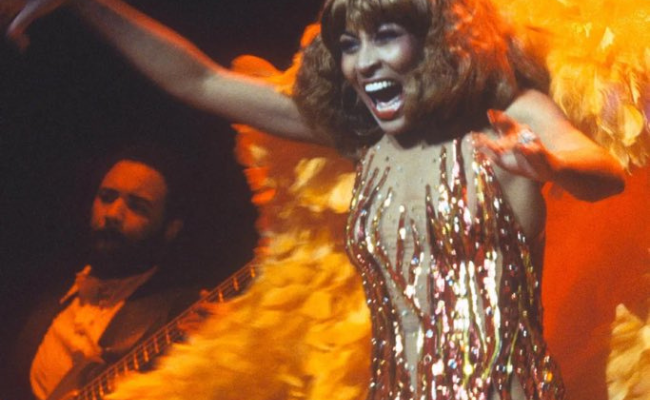 Tina Turner's Unforgettable Style: From Bob Mackie's Flame Dress to Versace's Glittering Slip