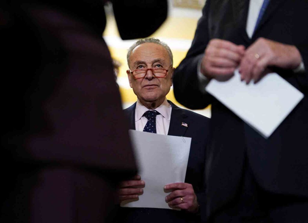 U.S. Senate Majority Leader Chuck Schumer (D-NY) listens to fellow Democrats speak to reporters at the Capitol in Washington, U.S., May 2, 2023. REUTERS/Kevin Lamarque