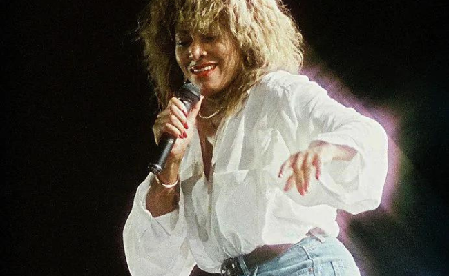 Tina Turner's Unforgettable Style: From Bob Mackie's Flame Dress to Versace's Glittering Slip