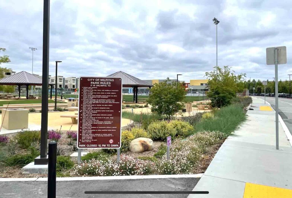 Milpitas, California's Delano Manongs Park has a sports field, a dog park, picnic areas, walking trails, a playground, a pedestrian bridge, a potable water well, and public restrooms. CITY OF MILPITAS