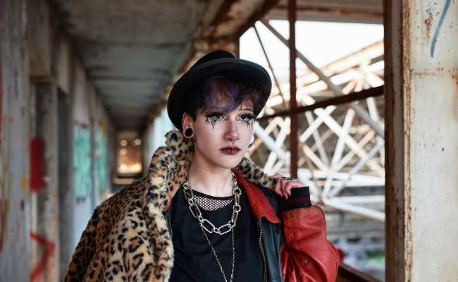 Young person wearing punk accessories