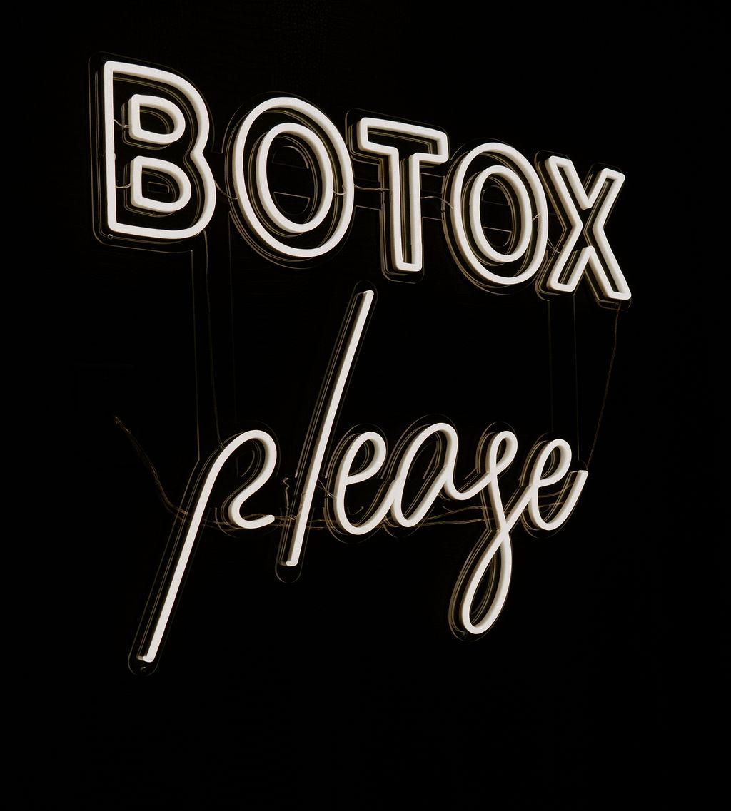 Sign "Botox Please" with black background