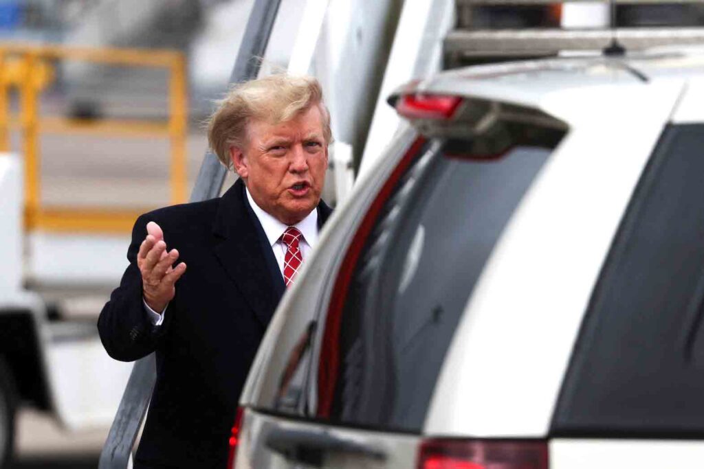 Former U.S. President and Republican presidential candidate Donald Trump gestures after arriving at Aberdeen International Airport in Aberdeen, Scotland, Britain May 1, 2023. REUTERS/Russell Cheyne