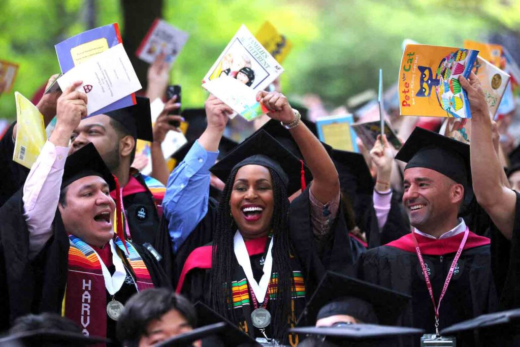 School of Education graduates react after receiving their degrees during Harvard University's 372nd Commencement Exercises in Cambridge, Massachusetts, U.S., May 25, 2023. REUTERS/Brian Snyder/