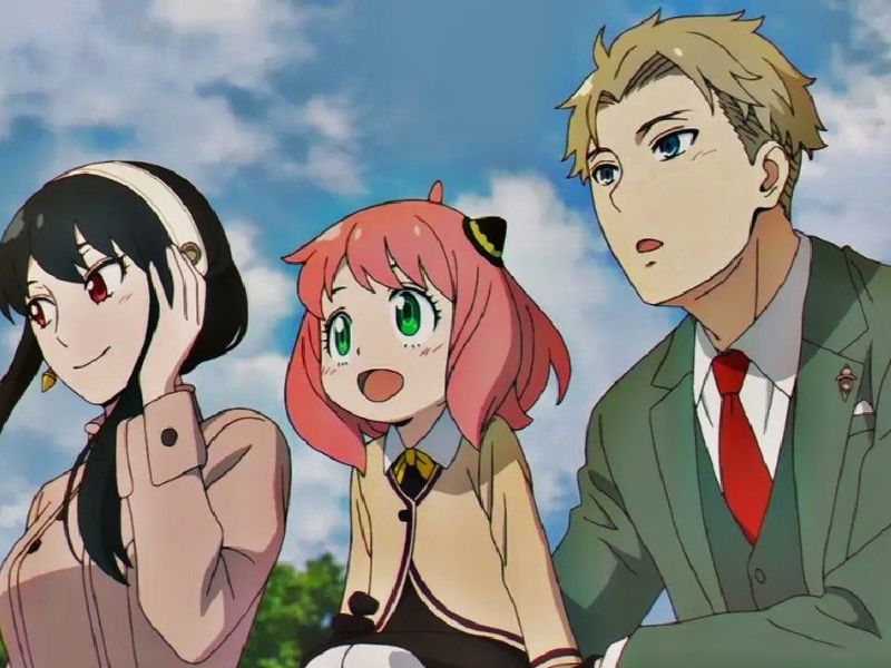 The main characters, Loid Forger, Yoru Briar, and Anya Forger, posing as a loving family.