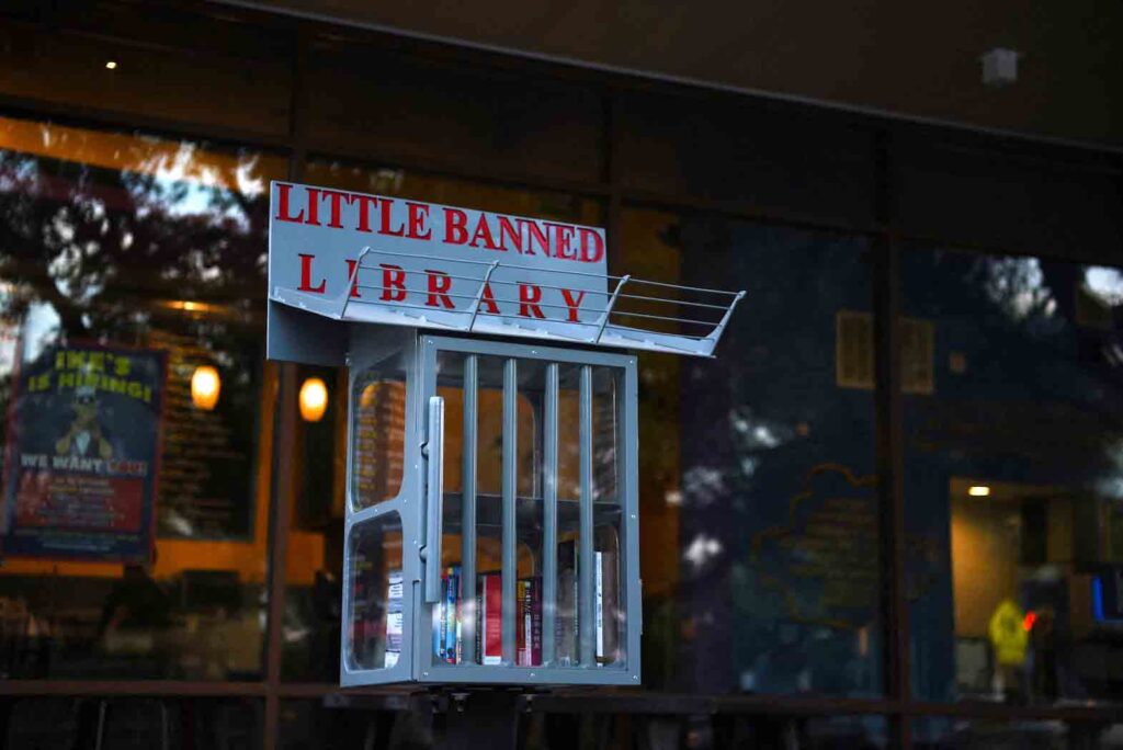 A Little Free Library, the local variation of which has been dubbed "Little Banned Library" and which was designed to look like a prison, invites residents to take books that the library says have been challenged by schools across the state of Texas, in Houston, Texas, U.S. May 3, 2023. REUTERS/Callaghan O'Hare/File Photo