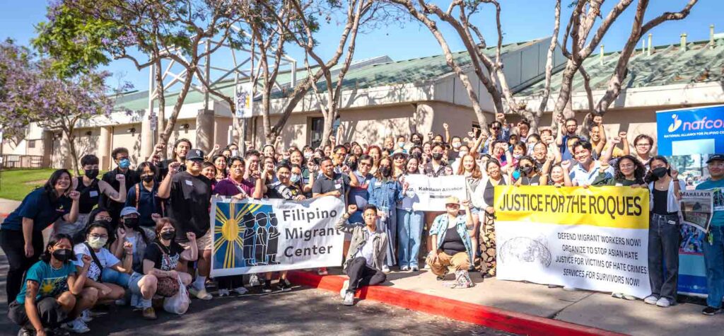 Participants of the Stop Asian Hate symposium gather at Veterans Park in Carson for a photo after the event. SIKLAB