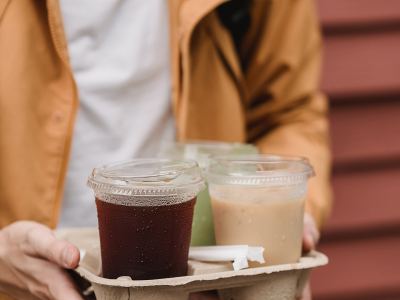 Image of compostable coffee cups, offering an eco-friendly alternative to single-use plastic cups