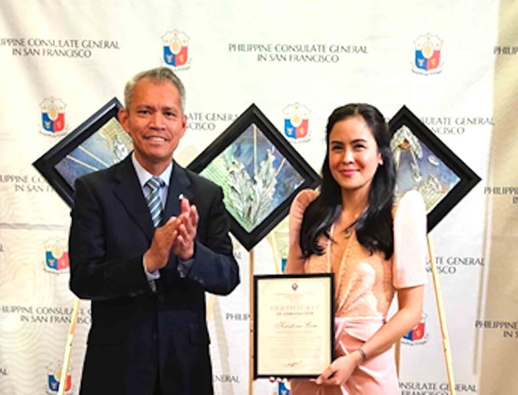 Consul General Neil Ferrer and missionary visual artist Kristine Lim unveil the main artworks of the Kuwento ng Alon exhibition at the Kalayaan Hall of the Philippine Center in San Francisco. CONTRIBUTED