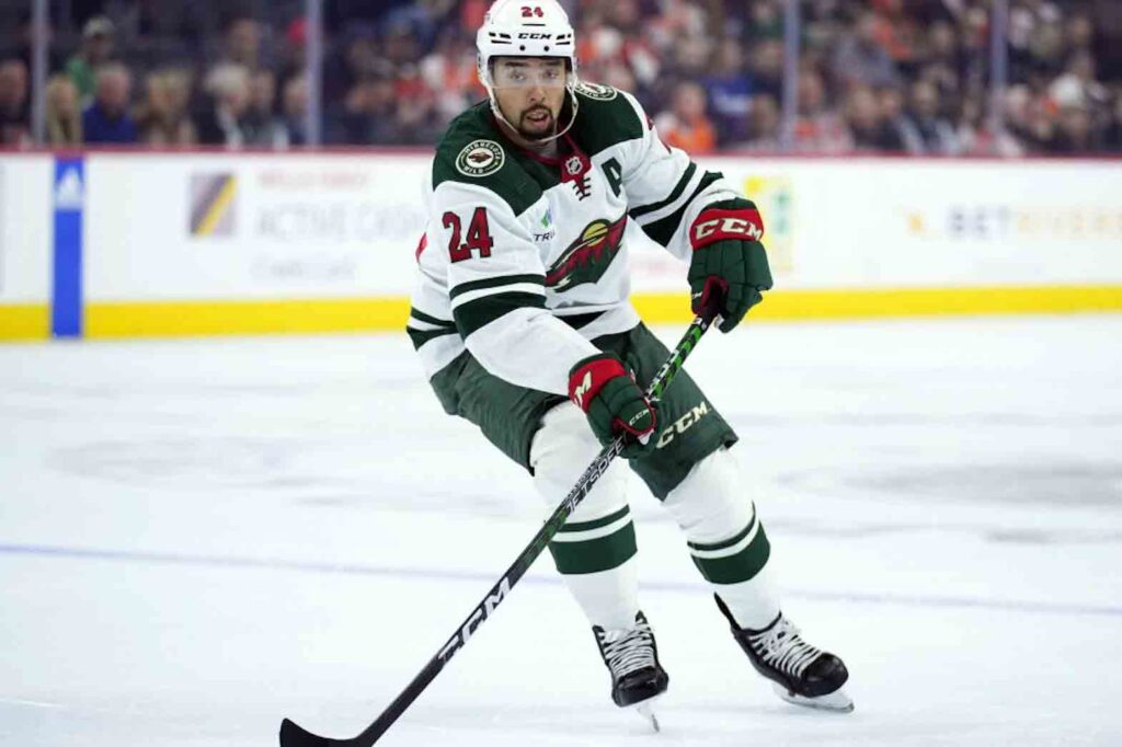 Minnesota Wild’s Matt Dumba controls the puck during an NHL hockey game against the Philadelphia Flyers, March 23, 2023, in Philadelphia. Dumba has agreed to a one-year, $3.9 million contract with the Arizona Coyotes, a person familiar with the deal told The Associated Press. The person spoke on condition of anonymity because the contract has not been signed yet. (AP Photo/Matt Slocum, File)