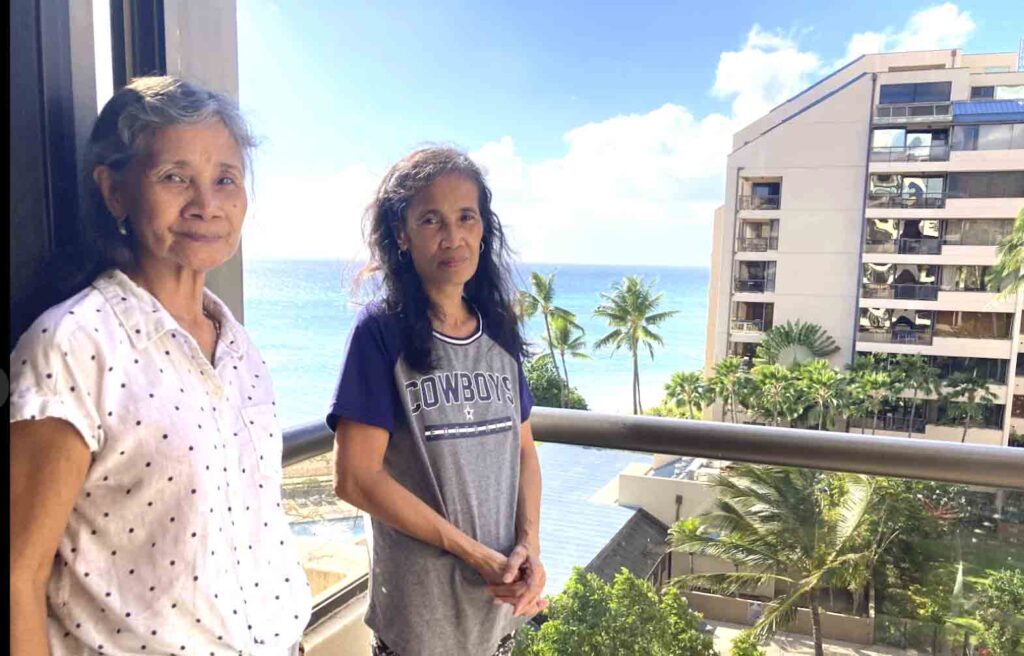 Evangeline Balintona (left) and Elsie Rosales are among many Filipinos who work as housekeepers in Maui’s hotel industry. They are temporarily living in hotel rooms after losing their homes to a deadly fire. AP PHOTO
