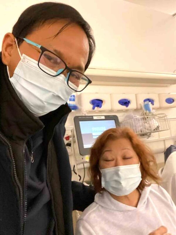 Couple Nicanor Arriola (left) and Julienne Ochengco comfort each other at a hospital after they were attacked. They Filipino couple attacked in Sacramento early this year is pressing on with their case against their attackers. CONTRIBUTED