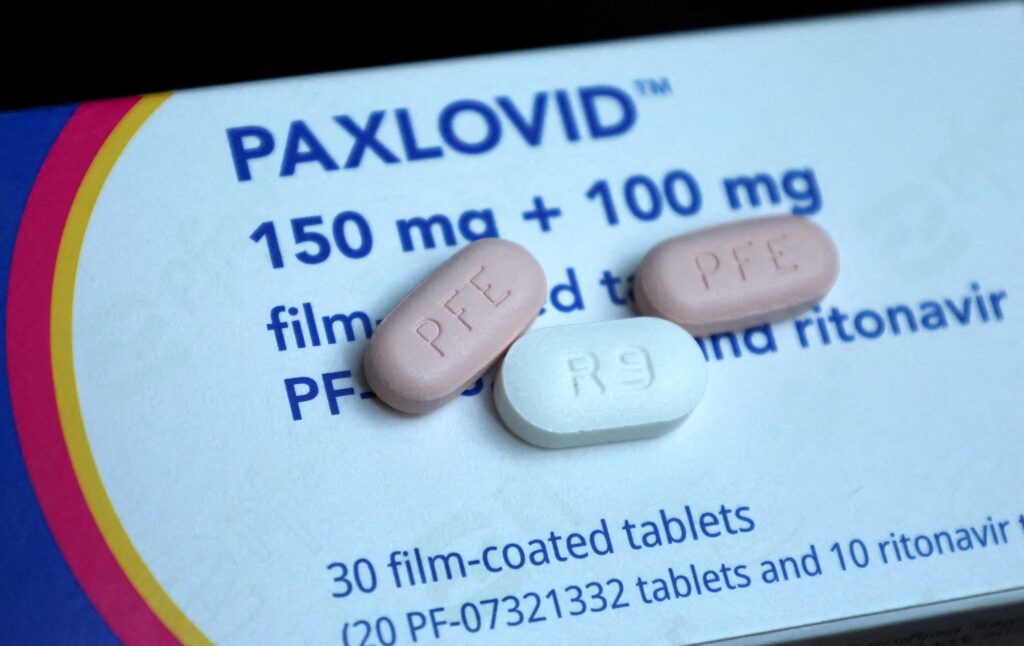 Paxlovid, Pfizer's antiviral medication to treat the coronavirus disease (COVID-19), is displayed in this picture illustration on taken October 7, 2022 | Illustration/File photo by Wolfgang Rattay/Reuters
