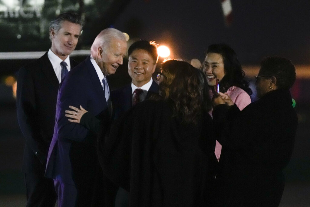 Biden greeted by elected officials