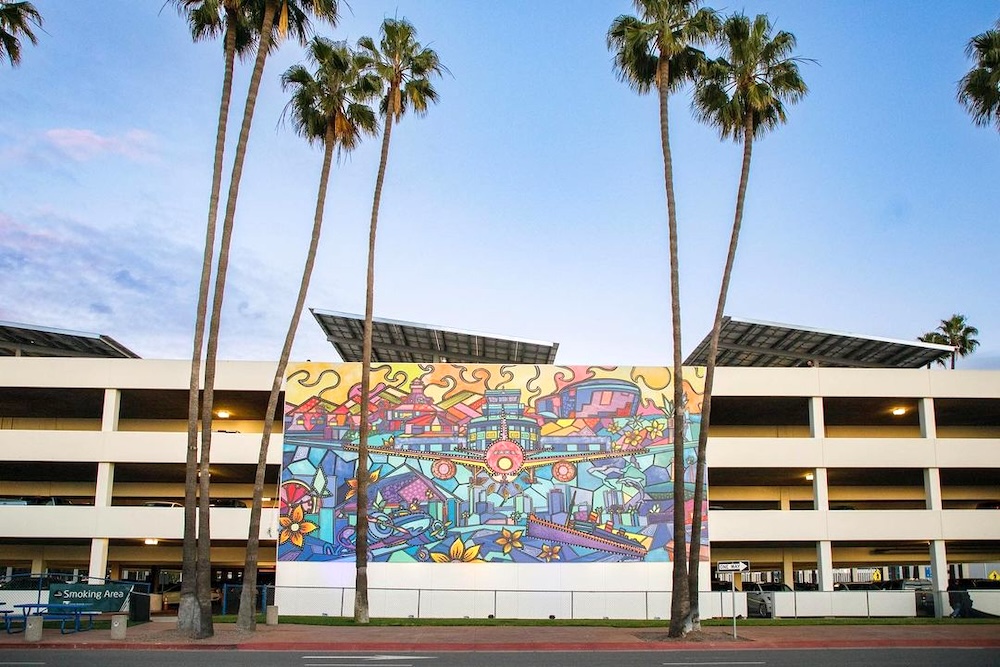 Filipino-American artist Marconi behind 3-story centennial mural at Long Beach Airport