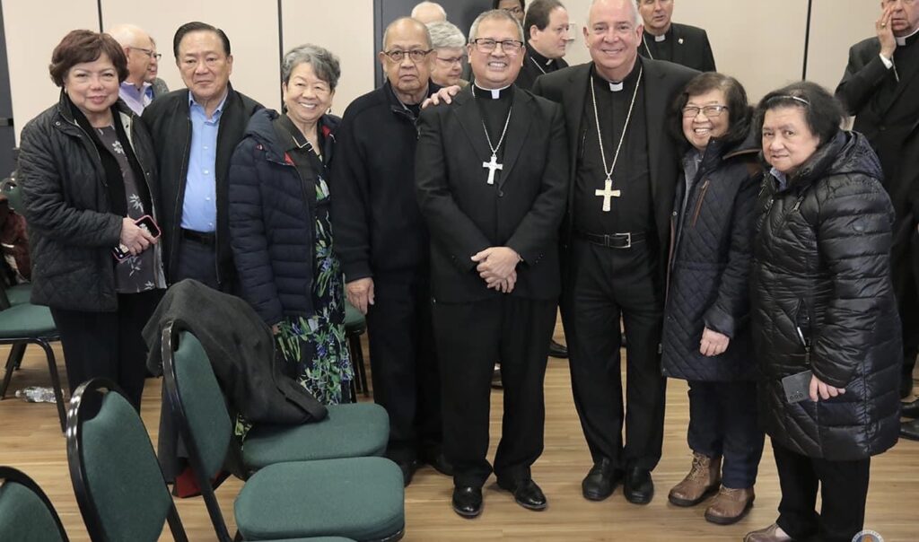 Esmilla and the archbishop with Fil-Ams
