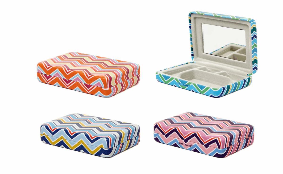 Compact Kikkerland jewelry case with sections for rings, earrings, and necklaces.