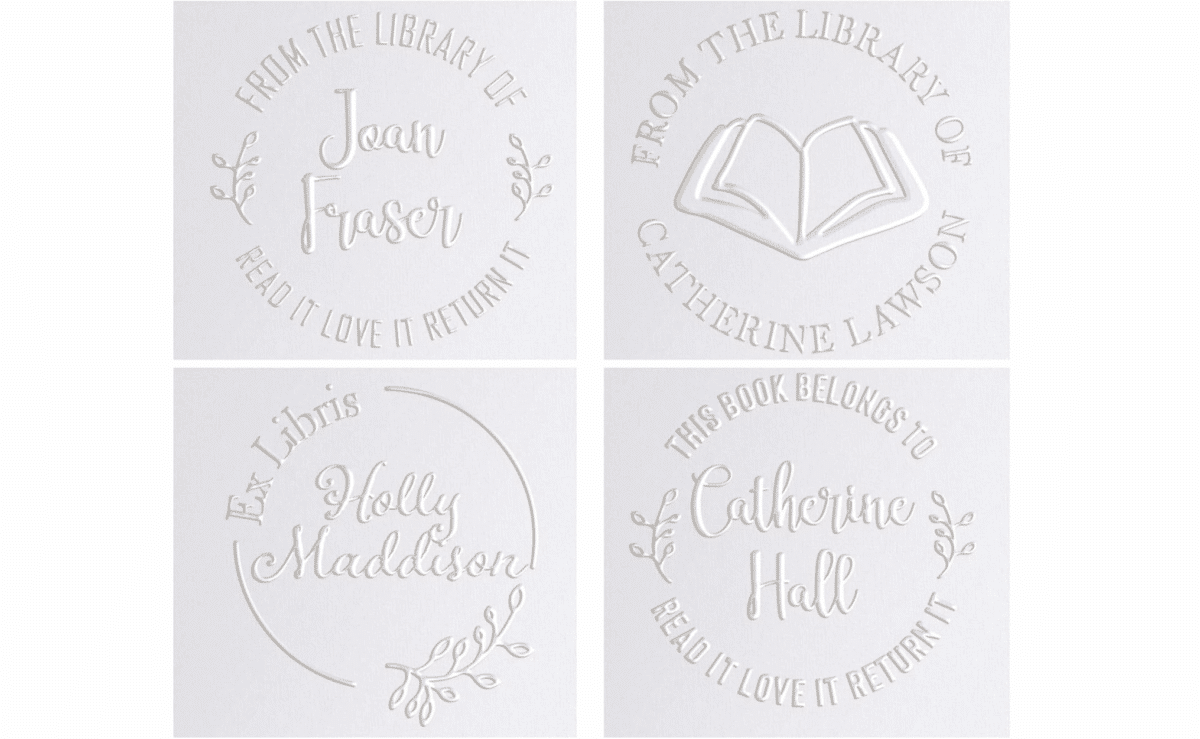 Set of personalized book embossers featuring various ex libris stamp designs.