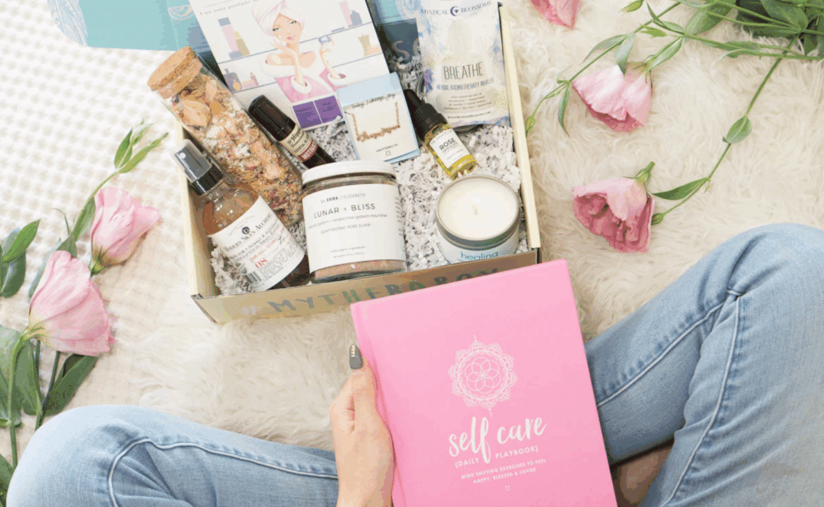 Self-care subscription box filled with relaxation and wellness items such as bath salts, aromatherapy oils, and a self-care journal.