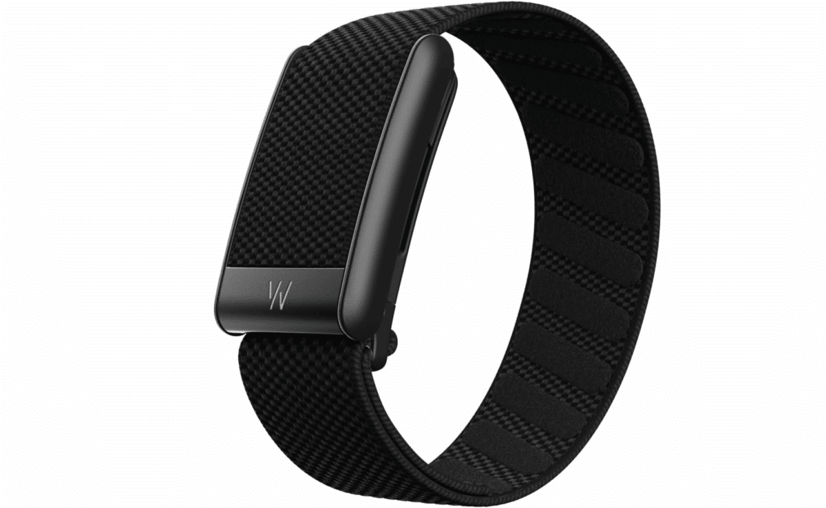 Whoop 5.0 fitness band on wrist tracking health and recovery.