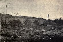 old balck & white photo of san juan bridge