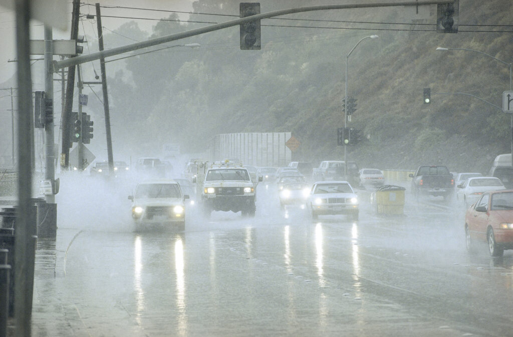 Cars on freeway under heavy rains