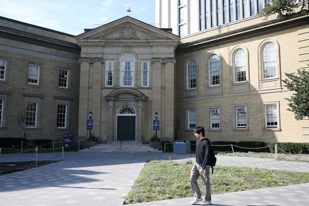 A student walks in front of the University of Toronto, St. George campus, in Toronto, Ontario, Canada September 26, 2023. REUTERS/Wa Lone/File Photo