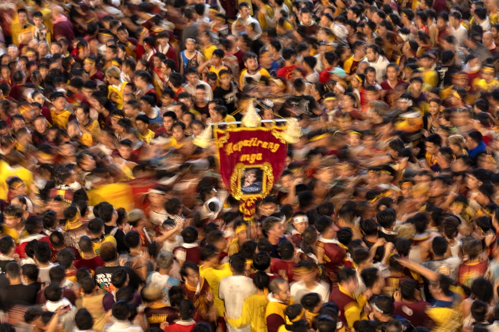 Filipino devotees join the annual Catholic procession of the Black Nazarene during its feast day in Manila, Philippines, January 9, 2024