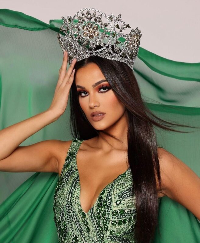 Miss Earth USA wearing a crown and a crystal embellished green gown