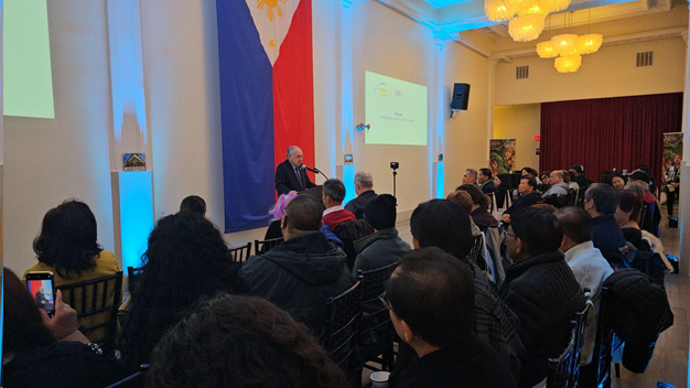 Ambassador Romualdez speaking at podium