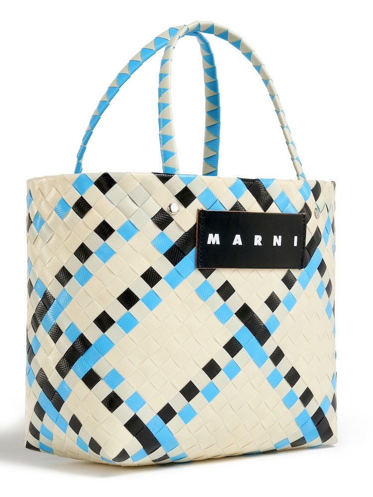 Marni’s website describes the Marni Market bag as “a multicoloured woven shopper with two-tone flat twin handles. Front black leather tag with logo.” | Photo from Marni’s website