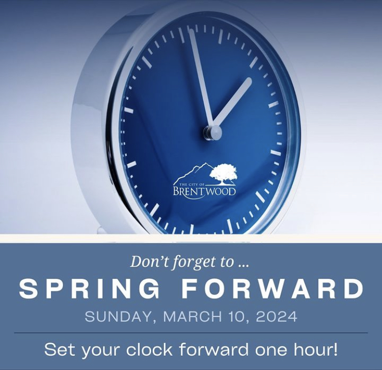 Clock with text "Spring Forward"