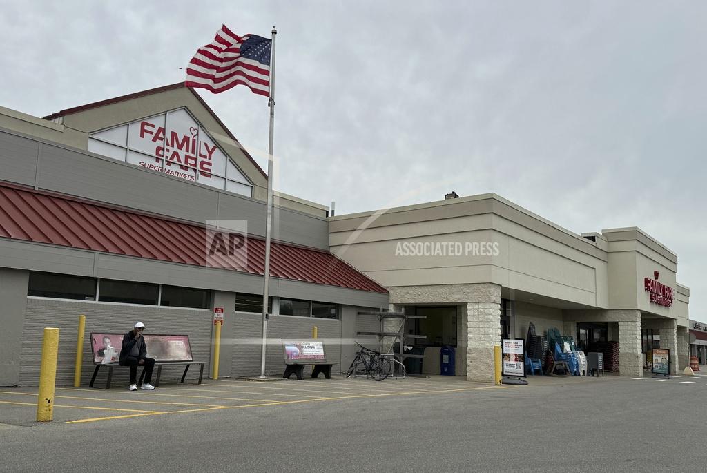 Homeless woman was living inside Michigan rooftop store sign with computer and coffee maker