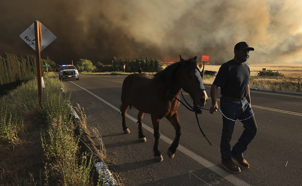 California firefighters continue battling wildfire east of San Francisco