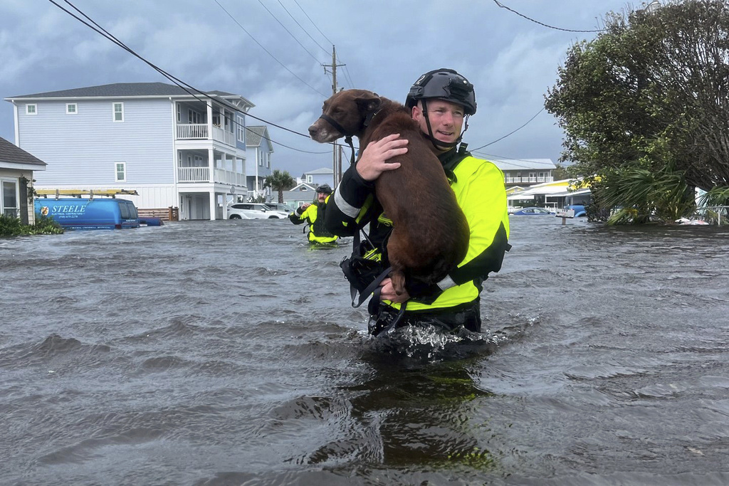 'Firehose' storm hits part of North Carolina and scientists see climate change