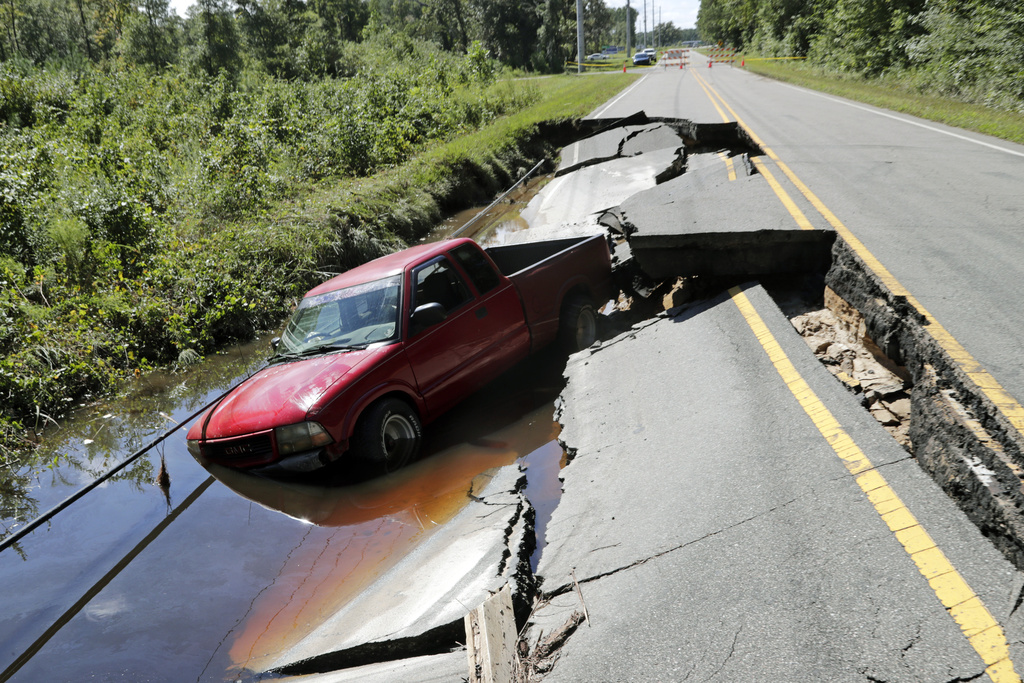 'Firehose' storm hits part of North Carolina and scientists see climate change