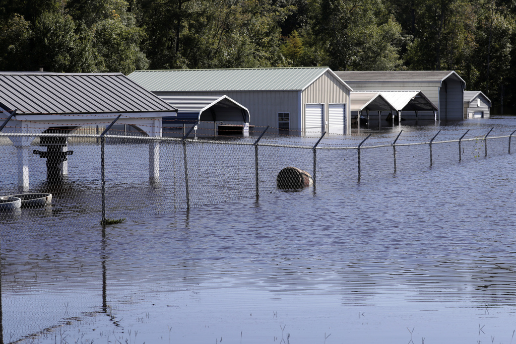 'Firehose' storm hits part of North Carolina and scientists see climate change