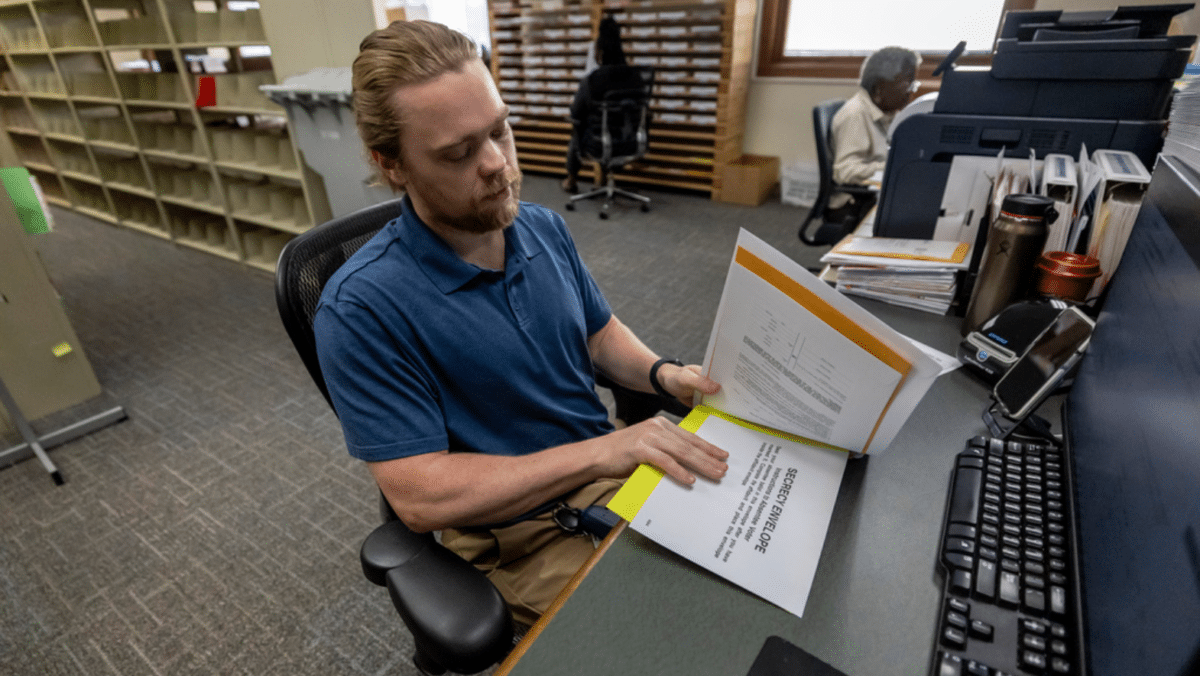 The first general election ballots are going in the mail as presidential contest nears