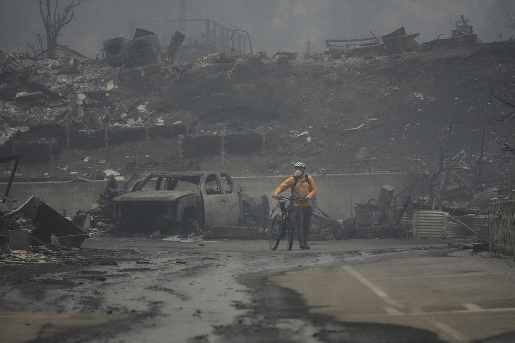 PHOTOS: Powerful images show destruction on path of deadly wildfires