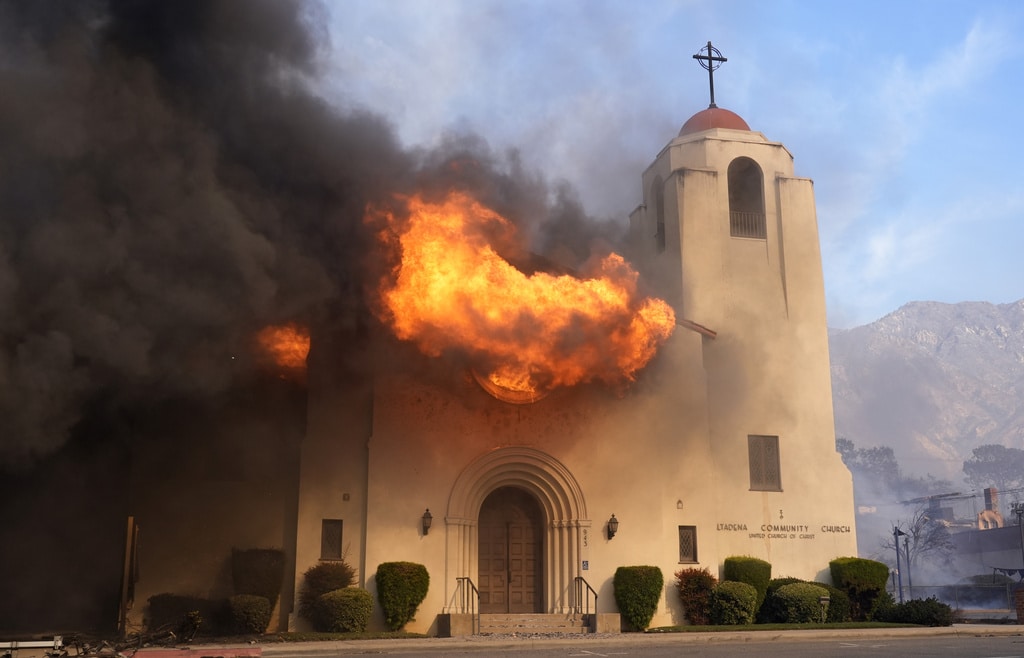 Wildfires burn out of control across LA and kill 5 as thousands flee homes