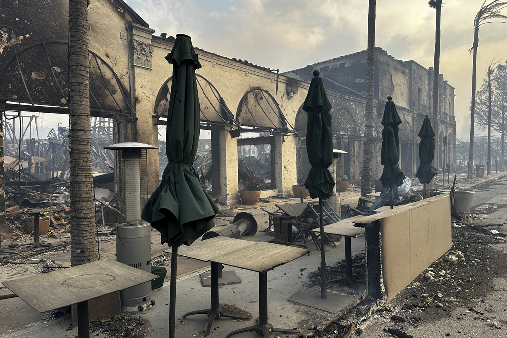 PHOTOS: Powerful images show destruction on path of deadly wildfires