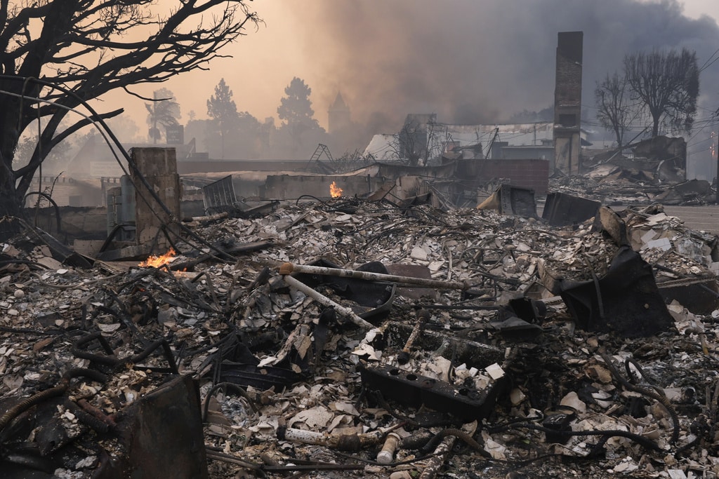 PHOTOS: Powerful images show destruction on path of deadly wildfires